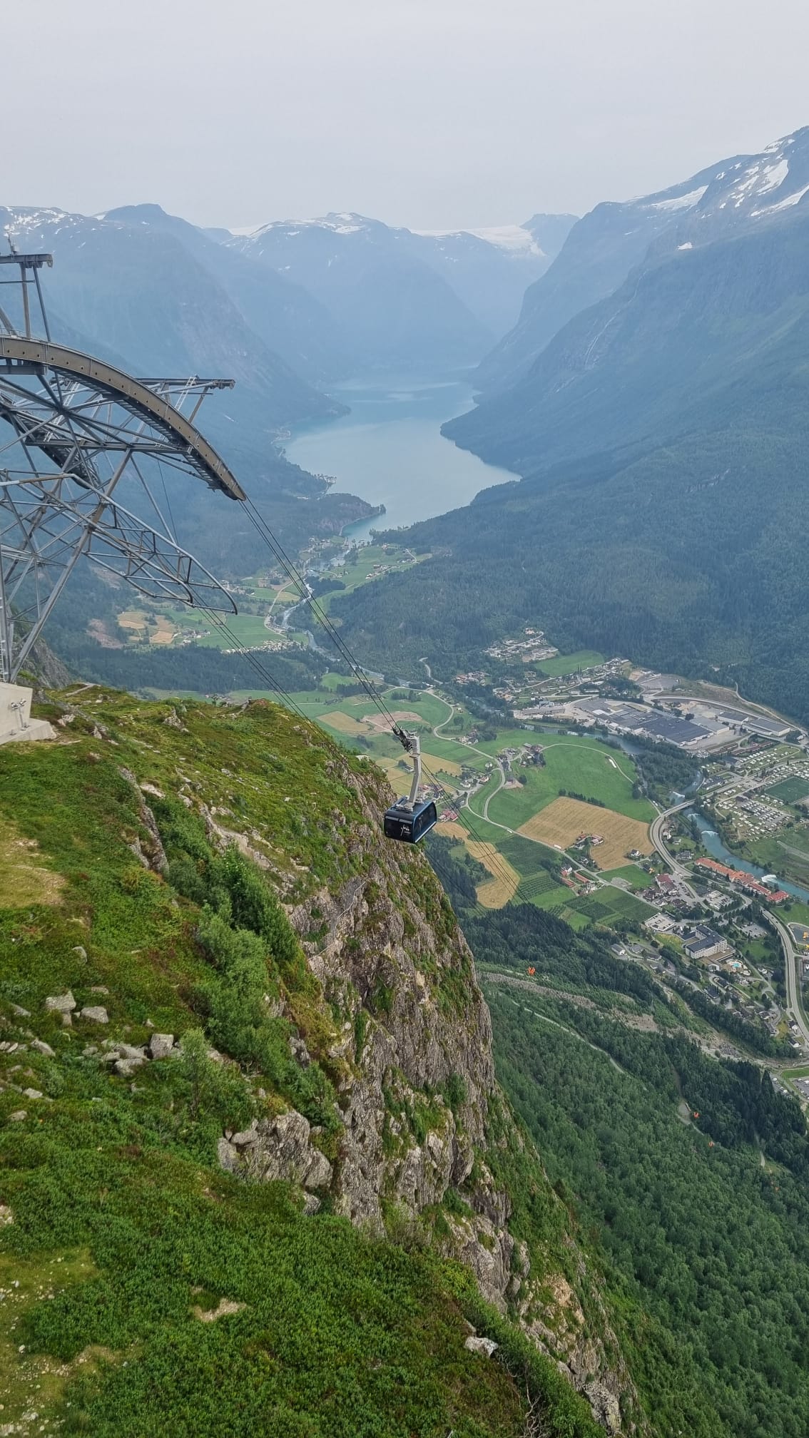 The Loen Skylift rising towards Mount Hoven with the fjord and mountains beyond